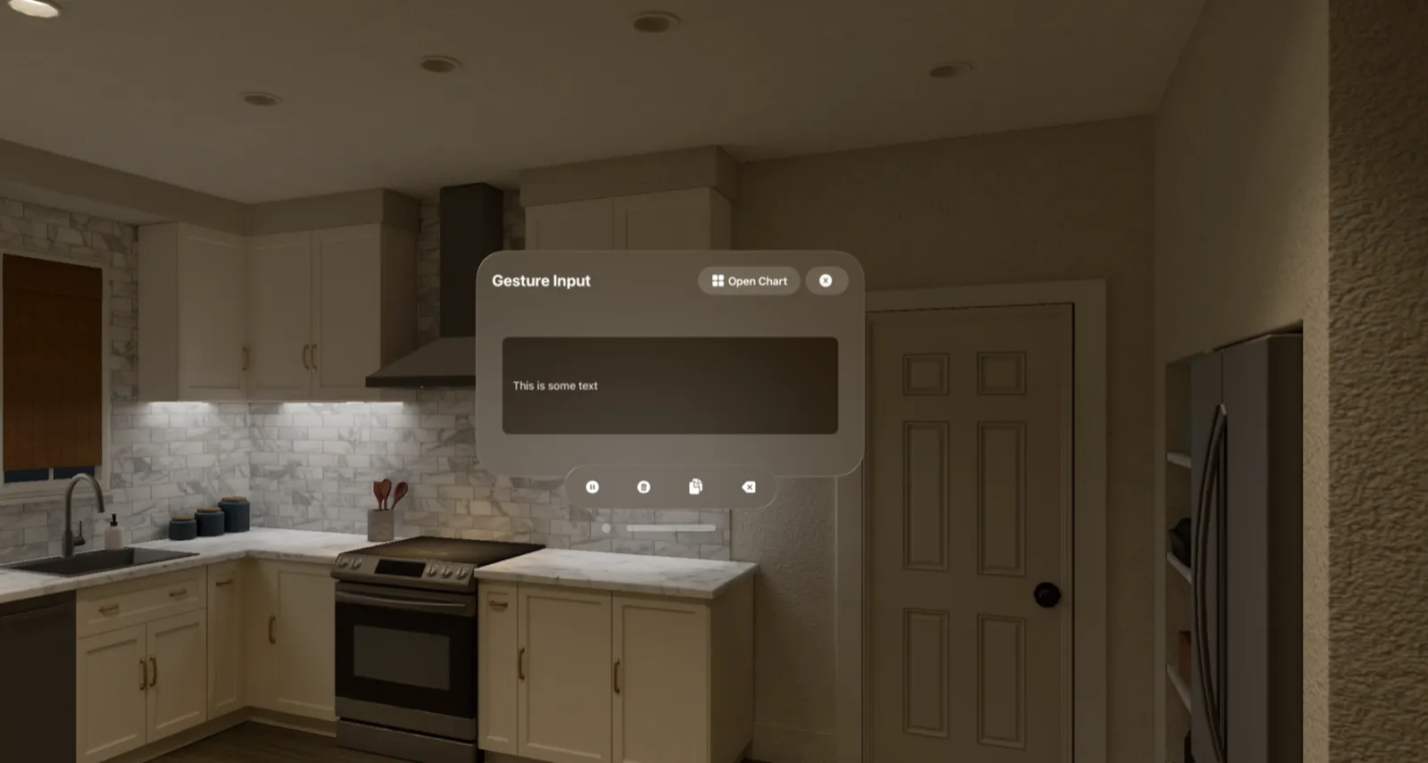 The built Gesture Input window in a simulated kitchen: a text field reading “This is some text,” an Open Chart button, and copy, clear, and backspace controls.